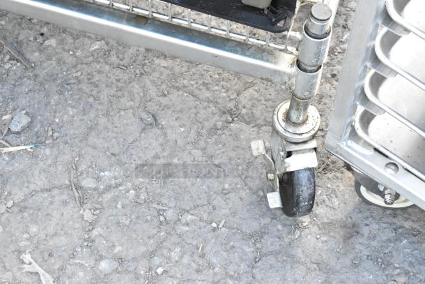 Metal cart with commercial casters and poly beverage dispensers. Features adjustable height markings and sturdy construction.