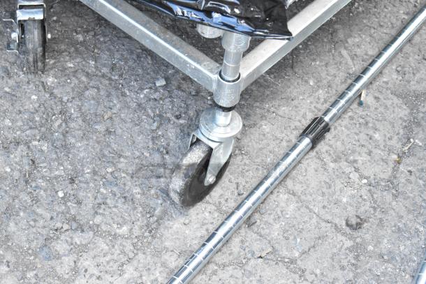 Chrome Finish 25-Tier Wire Shelving Unit on commercial casters, requires buyer dismantle, freight shipping needed.