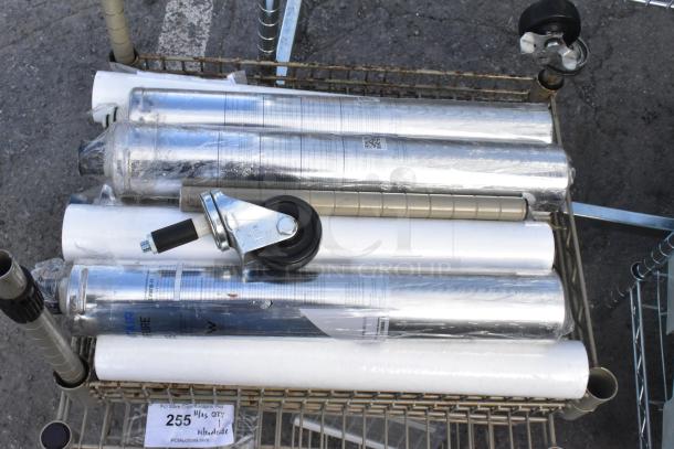 Tan wire shelf with multiple water filtration cartridges, includes caster wheels. Buyers must dismantle for shipping.