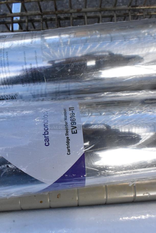 Tan wire shelf with water filtration cartridge, marked "carbonblock EV9618-11." Buyer must dismantle. Consider freight.