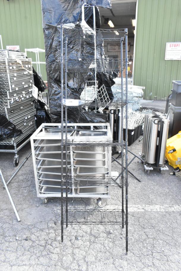 Black finish 6-tier wire shelving unit; buyer must dismantle. Consider freight charges. Suitable for storage or display.