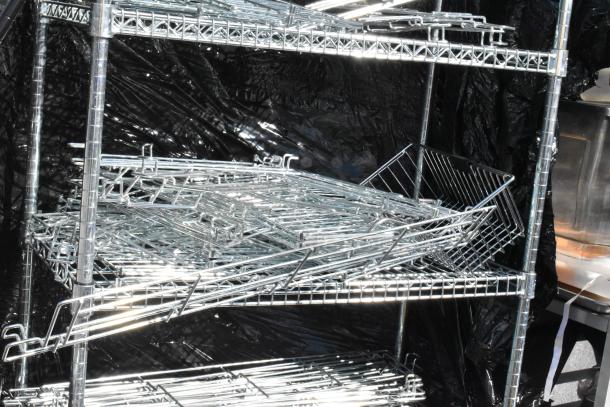 Chrome finish 6-tier wire shelving unit with assorted contents. Buyer must dismantle. Consider freight charges.