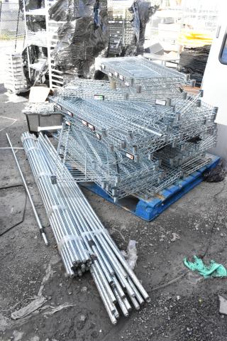 Chrome finish wire shelves and poles, stacked on a blue pallet. Includes varying sizes, grouped for bulk sale.