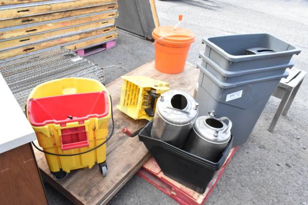 Lot of various items including gray Slim Jim trash cans, stainless steel kegs, and a yellow mop bucket. Items appear used.