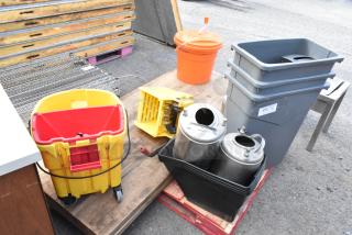 Lot of various items including gray Slim Jim trash cans, stainless steel kegs, and a yellow mop bucket. Items appear used.