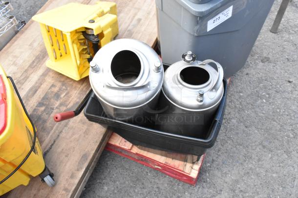 Lot includes gray Slim Jim trash cans, stainless steel kegs, and a yellow mop bucket. Items are in used condition.