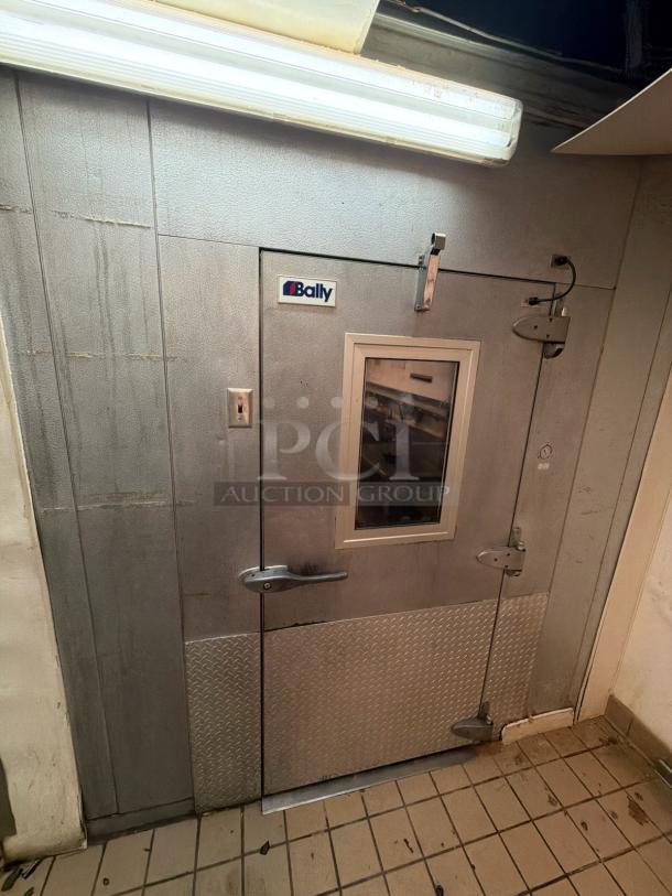 Bally 14'x8' walk-in freezer box with Copeland CS10K6E-PFV-256 compressor, visible door label. No floor included.