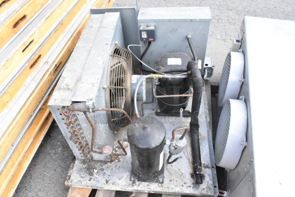 14'x8' Bally walk-in freezer with Copeland CS10K6E-PFV-256 compressor, Bally evaporator fan, no floor, shown before removal.