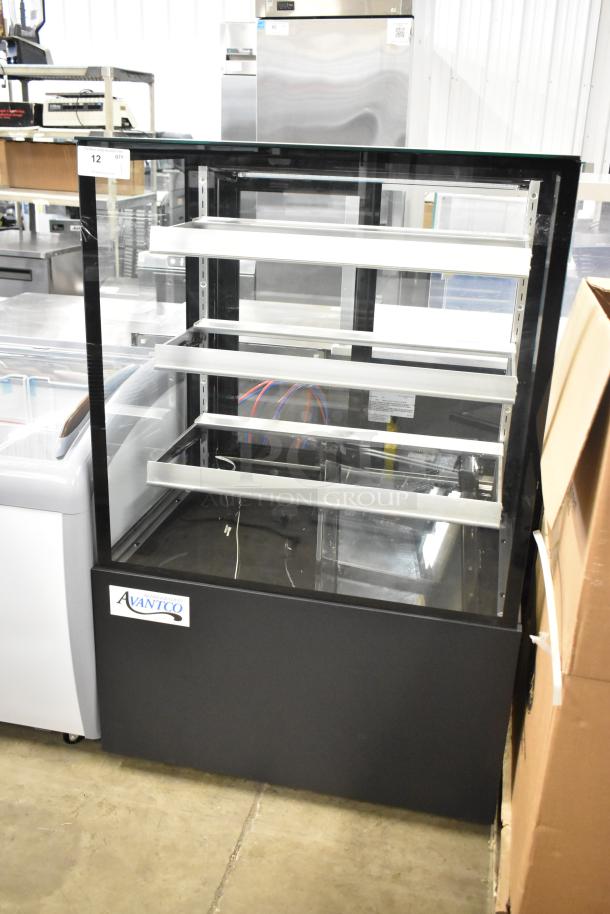 Brand new Avantco 193BCFD36B black dry bakery display case; LED lighting, on commercial casters, minor scratches.