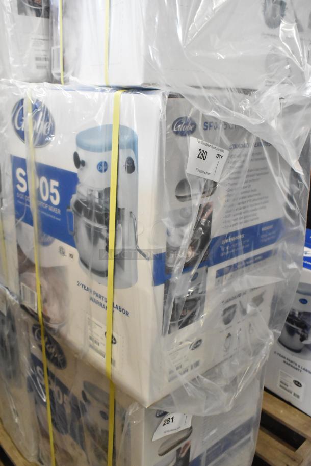 New Globe SP05 countertop dough mixer, 5 qt capacity, packaged in box, 115 volts, 1 phase, labeled with auction details.