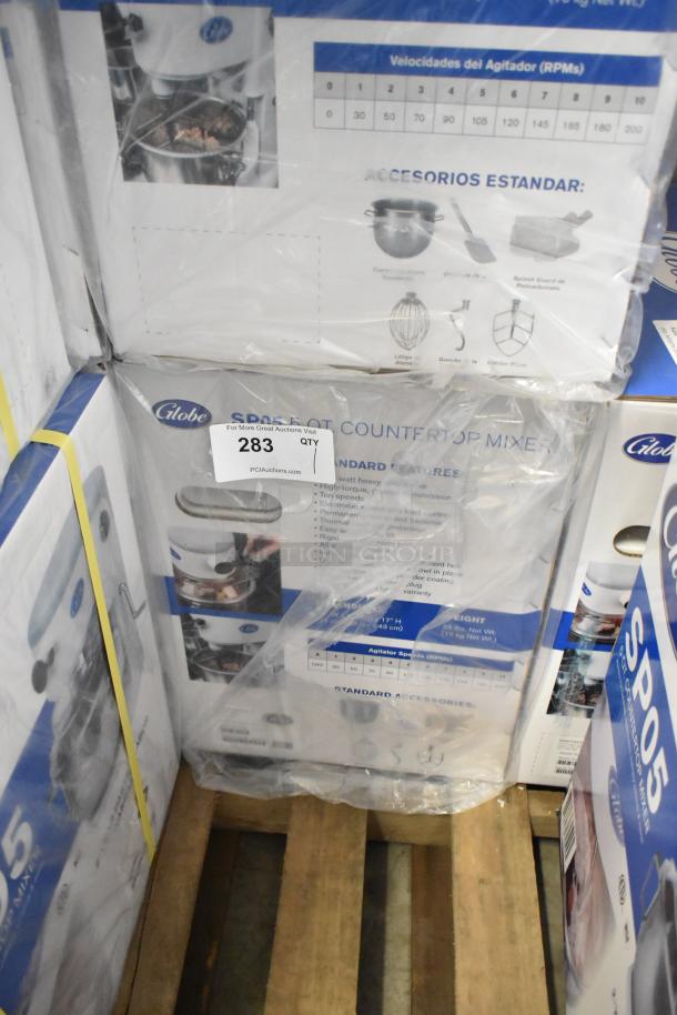 Brand new Globe SP05 Metal 5 Qt Planetary Dough Mixer, in original box. 115 Volts, 1 Phase. Includes standard accessories.