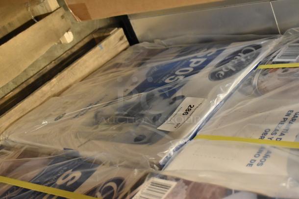 Boxed Globe SP05 5 Quart Planetary Dough Mixer, brand new, 115V, 1 Phase. Includes original packaging and labels.