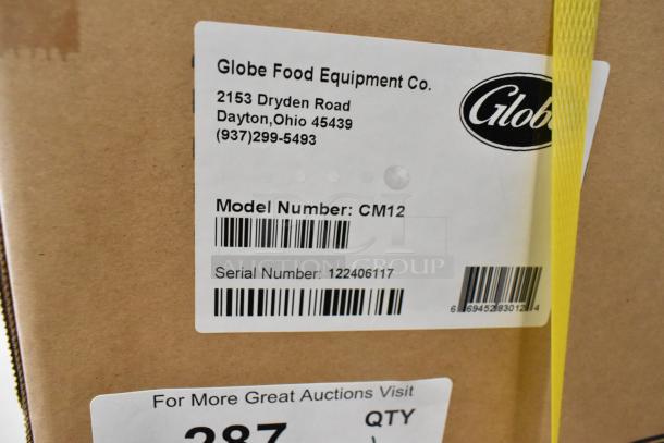 BRAND NEW Globe CM12 Stainless Steel Commercial Meat Chopper, 250 lbs/hr, #12 Head, 115V. Box label with model and serial number.