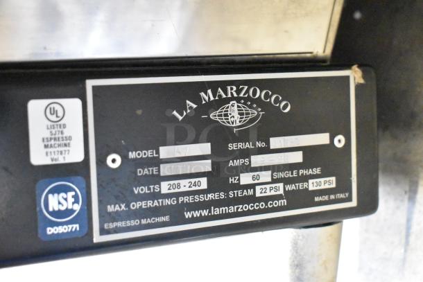 La Marzocco 3AV Linea Firenze label showing model, serial number, voltage (208-240V), and certifications.