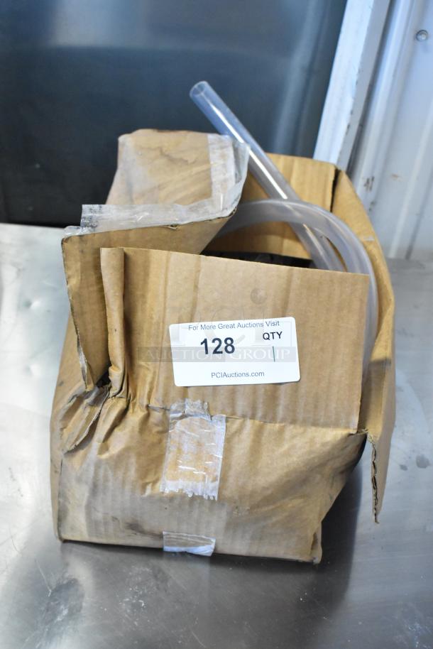 Ecolab LDS-AIR GAP Water Bucket Dispenser, taped cardboard box, visible tubing, auction tag labeled "128".