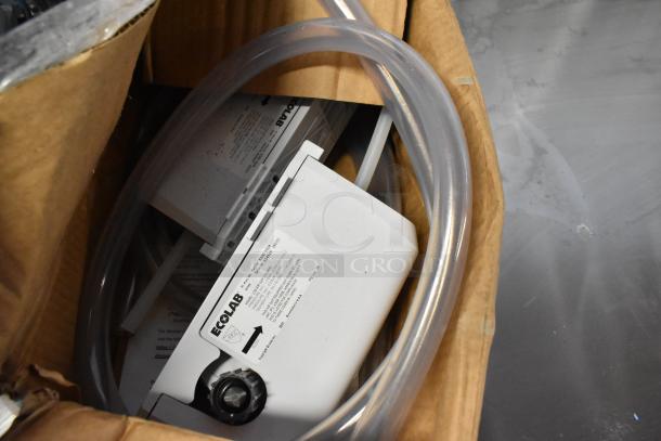 Ecolab LDS-AIR GAP Water Bucket Dispenser in box, includes transparent tubing, visible label with product details.