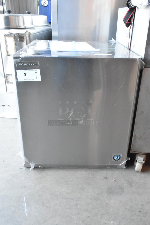 BRAND NEW 2024 Hoshizaki KMD-410MAJ Ice Head on Manitowoc Bin. Stainless steel, 115V, 1 Phase. Visible dents, tags shown.