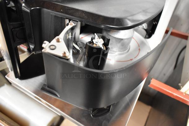 Hobart HWS-4C metal commercial hand wrap station, hot plate, 120V, with Hobart label printing scale, in good condition.