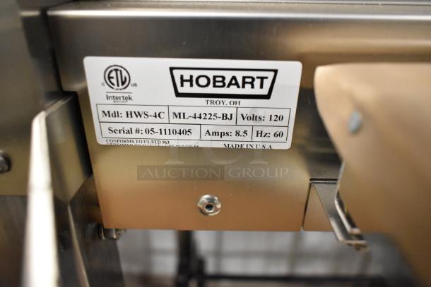 Hobart HWS-4C metal hand wrap station with label printing scale. Features 120 volts, 1 phase. Serial #05-1110405.