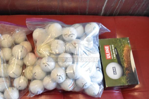 Lot of various golf balls, including TaylorMade and Callaway, in plastic bags. Some branding visible. Mixed condition.
