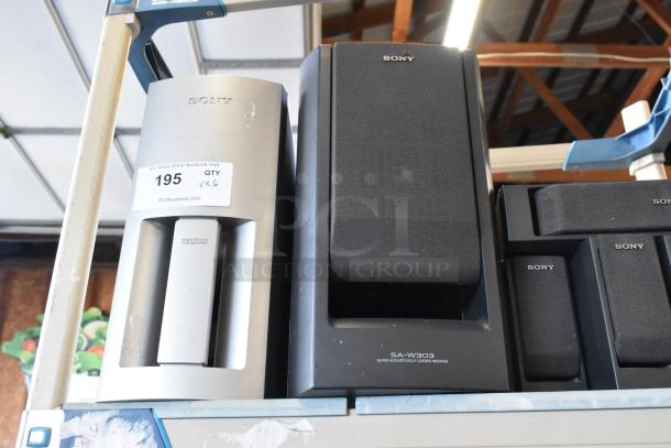 Sony speakers set including SA-W303 subwoofer; visible wear; label indicates auction lot 195, quantity of 6 items.
