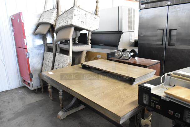 Wooden dining table with spindle legs, paired with six patterned chairs. Overall good condition, ideal for dining spaces.