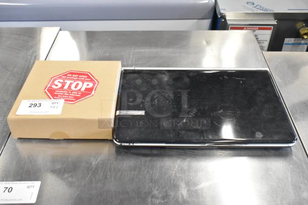 Netgear router in box with warning label and Gateway KAYF0 laptop on metal surface. Auction tag number 293 visible.