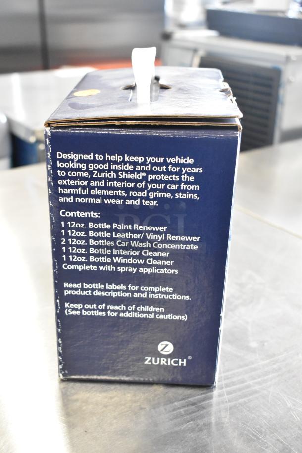 Zurich Shield Customer Care Kit box with product details: includes paint, leather, car wash, interior, and window cleaners.
