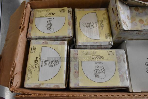 6 Precious Moments figurines in original boxes, featuring clowns and "Winter's Song". Models 12238, by Enesco. Mint condition.
