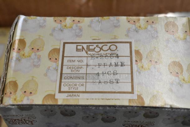 Box of Precious Moments figurines featuring clowns and Winters Song, 6 pieces, original packaging, Enesco label indicated.