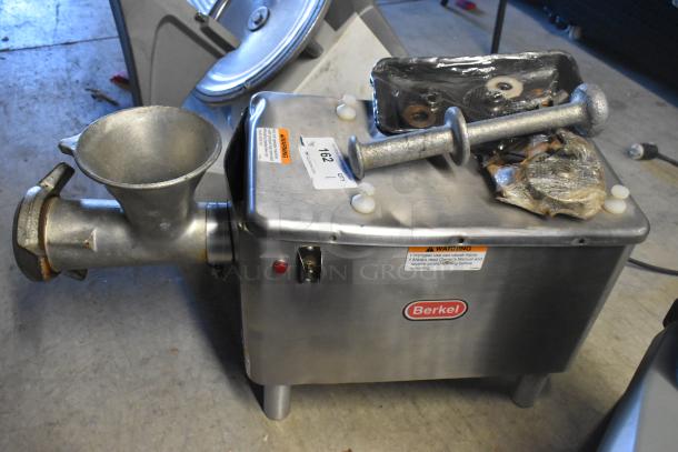 Berkel E-222 metal meat grinder, 115V, 1 phase, tested but not powering on. Visible warning labels and Berkel logo.