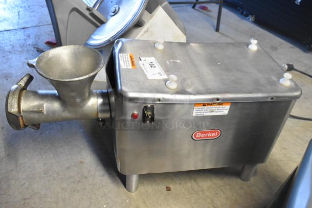 Berkel E-222 metal commercial meat grinder, countertop model; 115 Volts, 1 Phase. Condition: Tested, does not power on. Warning labels visible.