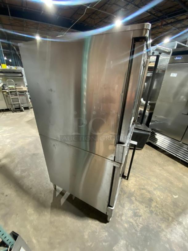 Blodgett double stacked stainless steel convection oven, natural gas powered, on legs, includes wired racks, used condition.