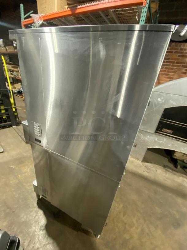 Blodgett stainless steel double-stacked convection oven on legs, natural gas powered, includes wired racks.