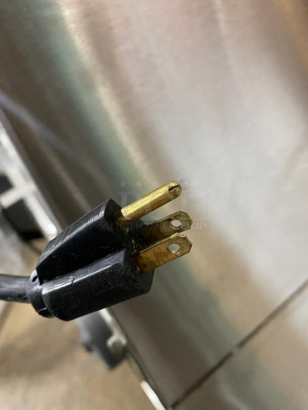 Blodgett commercial stainless steel convection oven plug, showing three-pronged connector, part of double-stacked oven unit.