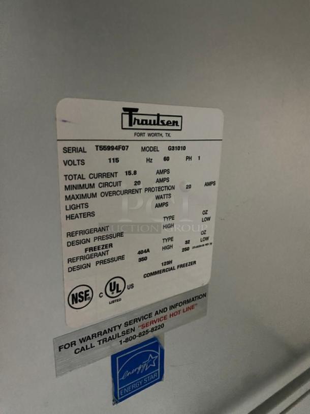 Traulsen Model G31010 commercial freezer label, featuring serial number T55994F07, 115V, UL and NSF certifications.
