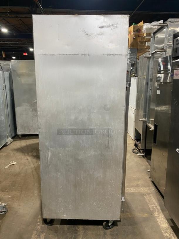 Traulsen G20010 stainless steel 2-door reach-in refrigerator, Energy Star certified, on casters, with poly coated racks.