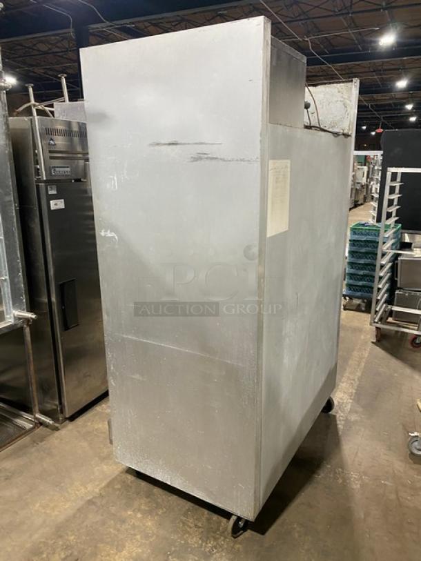 Traulsen G20010 commercial stainless steel 2-door reach-in refrigerator, on casters, Energy Star certified, with scuffs.
