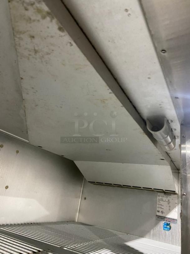 Traulsen G20010 commercial stainless steel 2-door reach-in refrigerator interior with poly-coated wired racks. Energy Star certified.