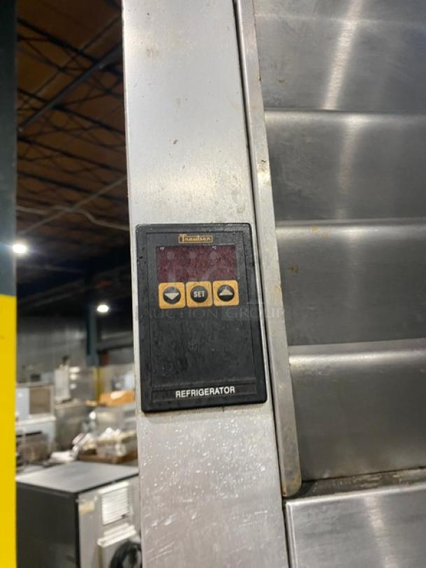 Traulsen G20010 stainless steel 2-door refrigerator, Energy Star certified, with poly-coated racks, model control panel shown.