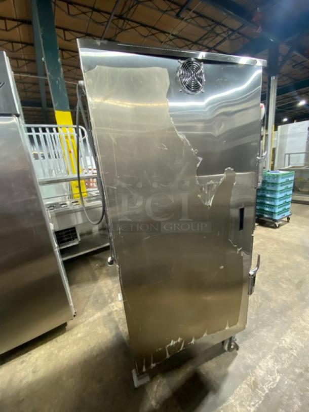 Carter-Hoffmann stainless steel heated holding cabinet, half door, electric, with pan slides, on casters, 120V 1 phase.