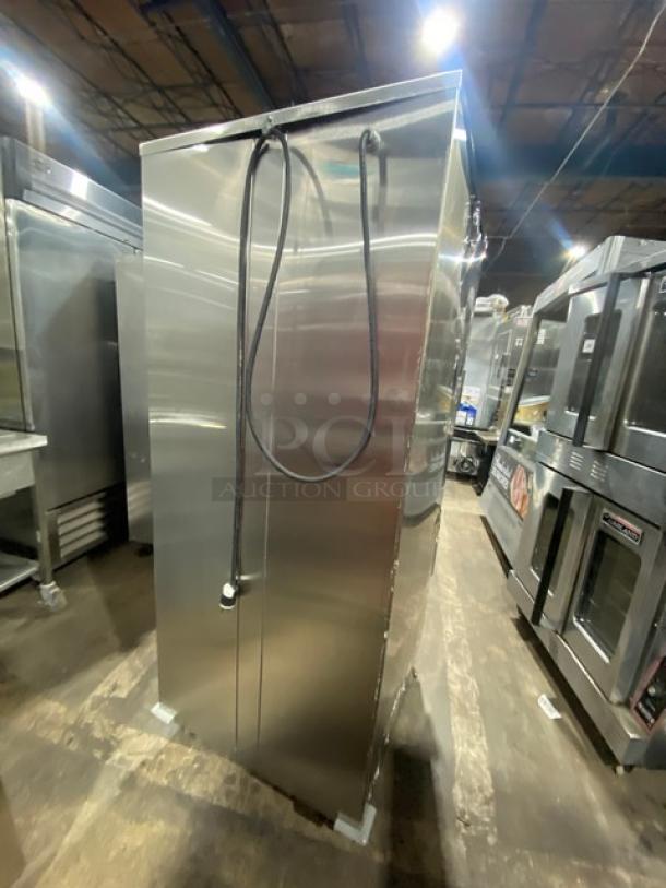 Carter-Hoffmann stainless steel heated holding cabinet, half door, with pan slides, 120V 1 phase, on casters, electric powered.