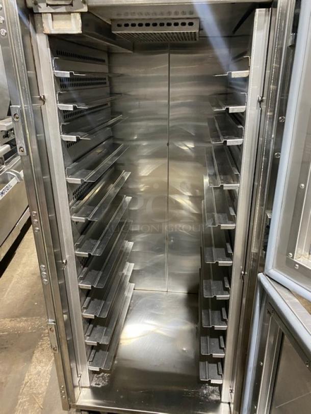 Carter-Hoffmann stainless steel heated holding cabinet, half door, pan slides, 120V, 1 phase, on casters, commercial use.