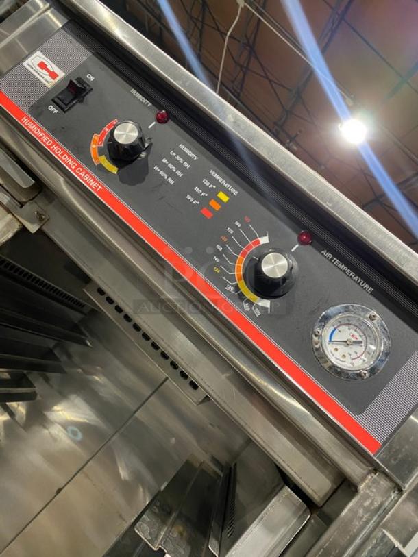 Carter-Hoffmann stainless steel heated holding cabinet with pan slides, control dials, and casters. 120V, 1 Phase.