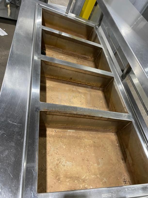 Atlas Metal stainless steel 4-well hot food/steam table, Model WIHD&M4. Includes sneeze guard, on casters, 208V, 1 phase.