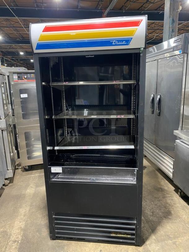 True TAC-36 black refrigerated open merchandiser with stainless shelves, multi-tier, ideal condition, 208-230V, 1 Phase.