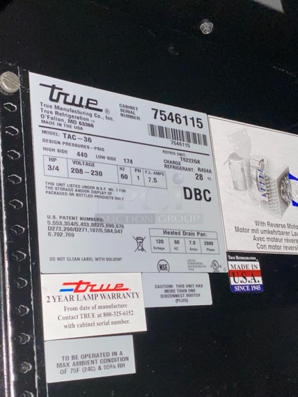 True TAC-36 commercial refrigerated merchandiser label. Features model, serial number 7546115, 208-230V, 1 phase.