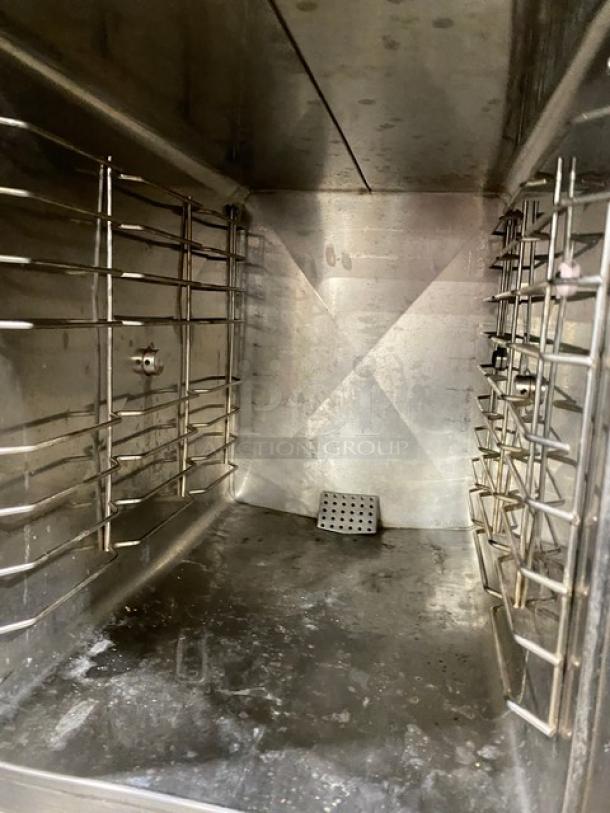 Market Forge ETP10E stainless steel convection steamer interior, dual compartment, electric, 480V, 3-phase, on legs.