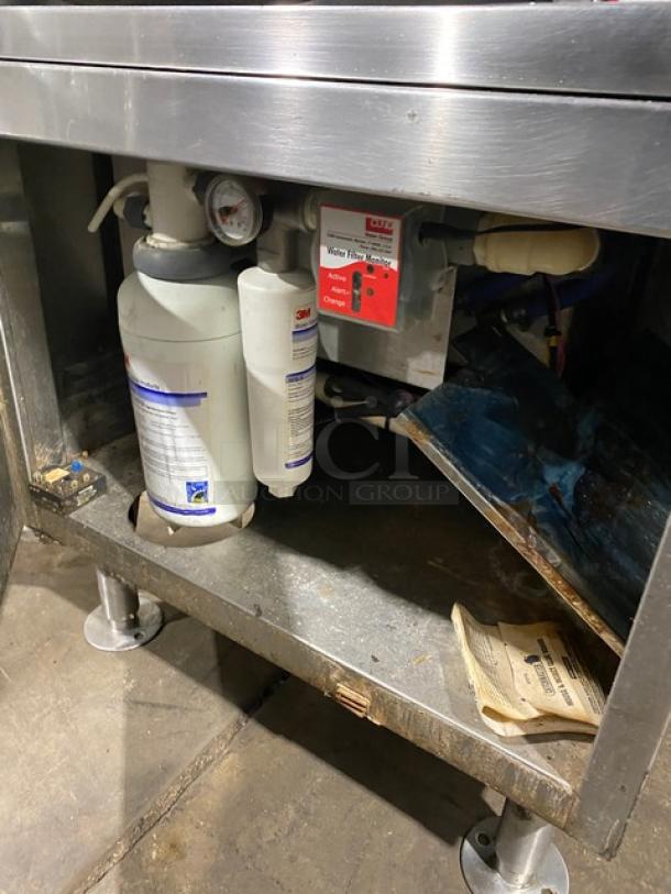 Market Forge ETP10E stainless steel dual compartment convection steamer, 480V 3 phase, with water filter and pressure gauge, on legs.