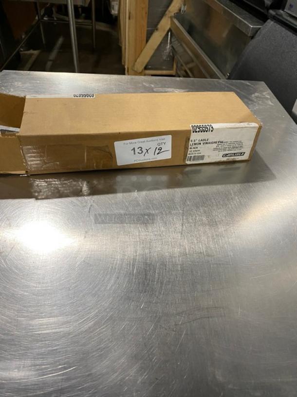 Brand new Carlisle 9.5" Lemon Vinaigrette Style Ladle, model 02955979, in original packaging.